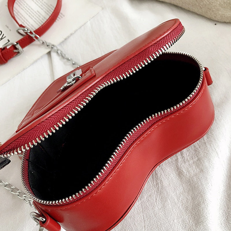 "ZIPPED HEART" CROSSBODY BAG